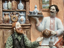 Рельеф "Купцы в трактире"